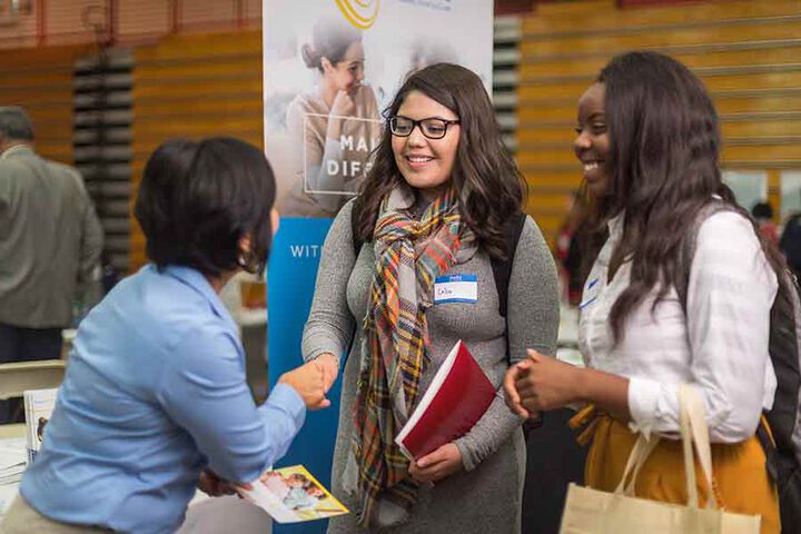 IU students engaging at a career fair.